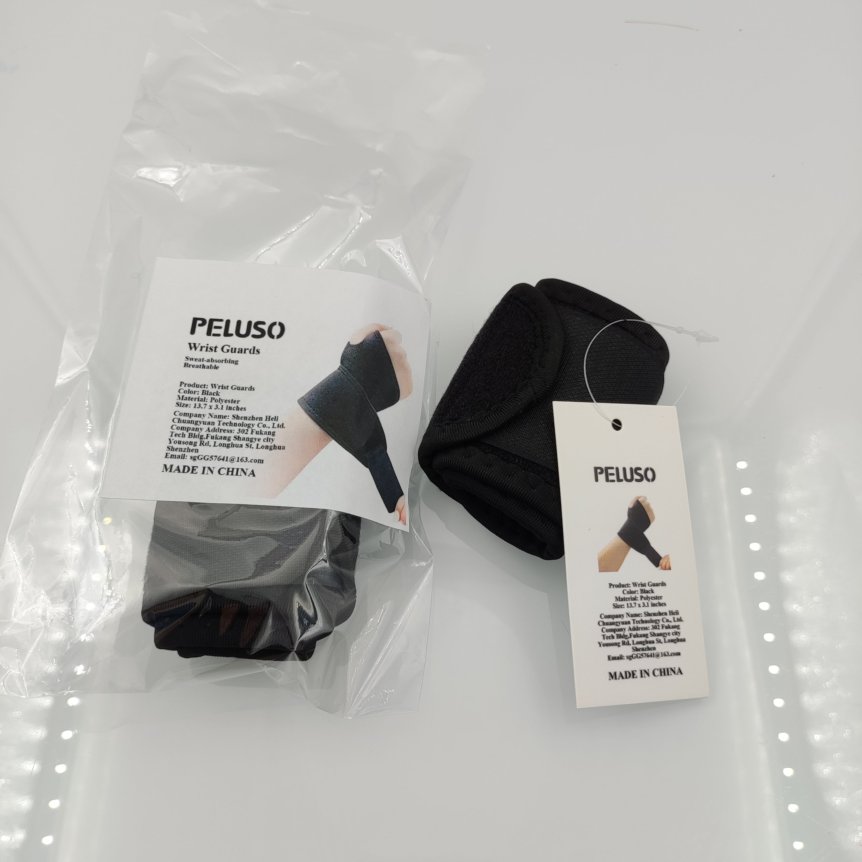 PELUSO Wrist guards for athletic use Black
